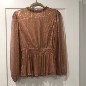 High neck sparkly top.